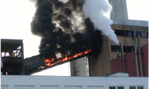 Fire in closed conveyor belt 