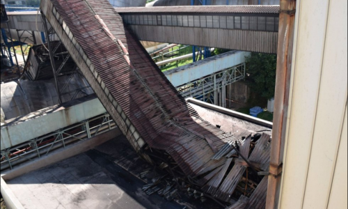 Closed coal conveyor belt after combustible dust explosion 